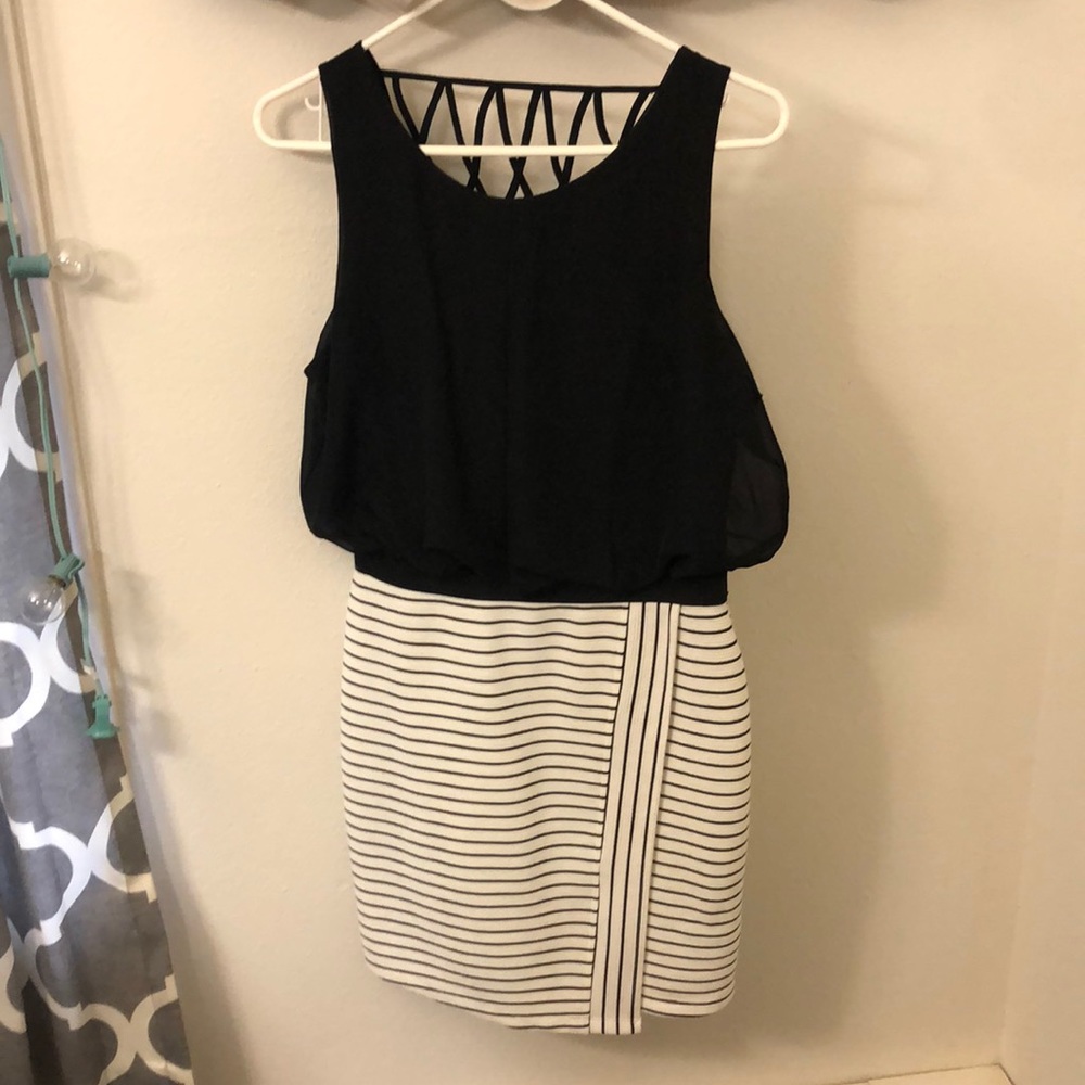 Dress w/ black top, patterned back, & tight skirt